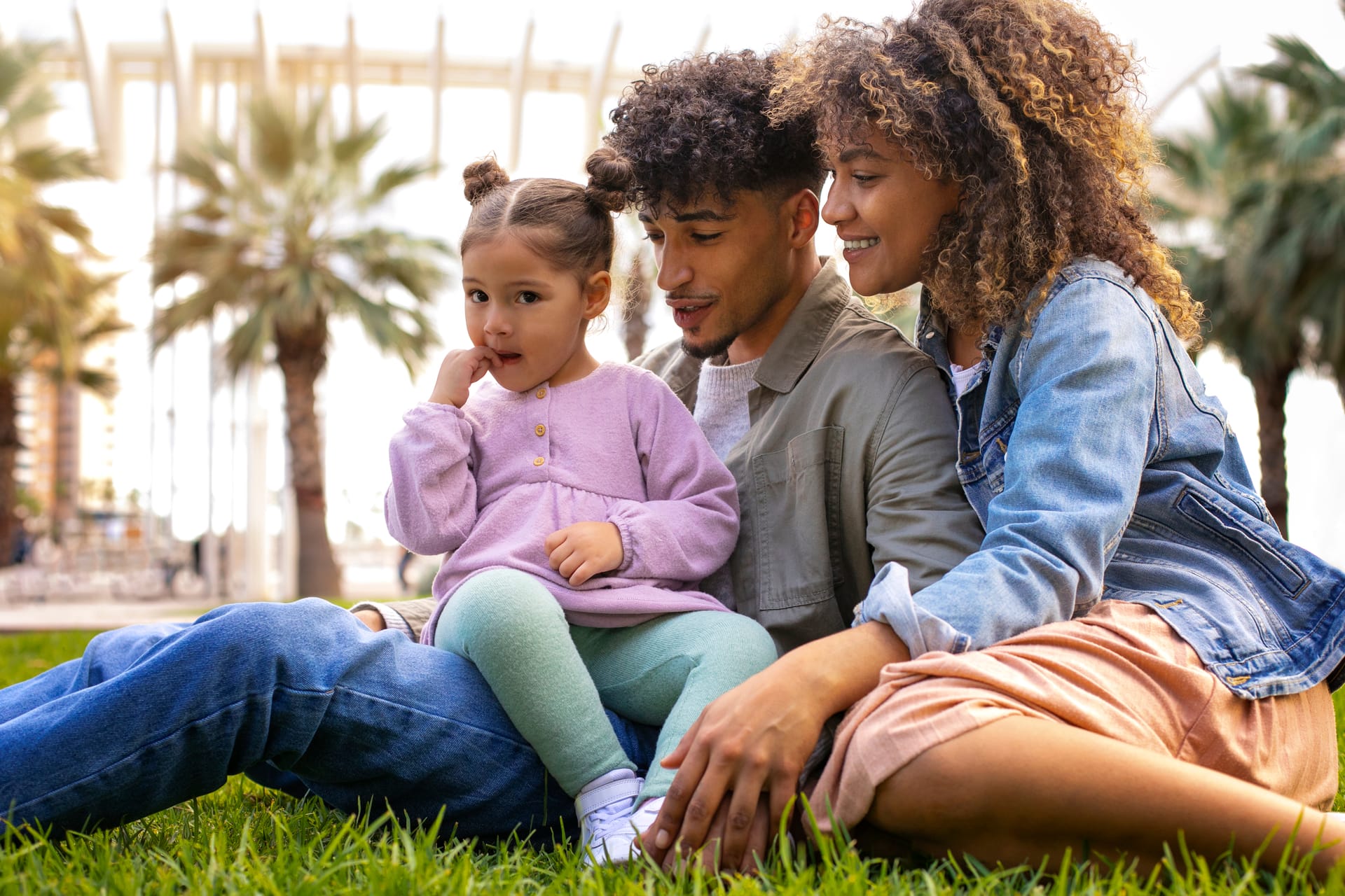 Family sitting together outdoors